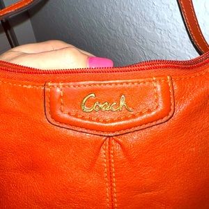 Orange Coach crossbody